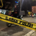 Polisi memasang garis polisi