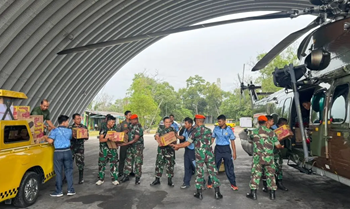 Helikopter TNI AU Salurkan Bantuan ke Sibolga
