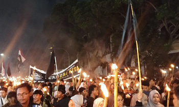 Pawai Obor di Medan Galang Dana Bencana